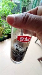 The drinking black coffee