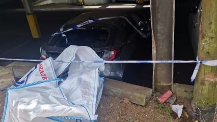 Damage caused after a vehicle collided with a multi-storey car park