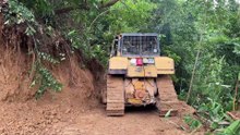 Hitting Heavy Terrain Bulldozer D6R XL Opens the Road in the Mountains