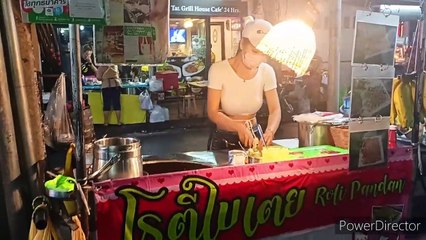 The Most Beautiful Roti Lady in Bangkok Thailand serving sweet banana pancakes on the street