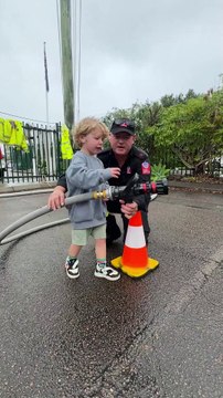 Youngsters get up close to the firefighting equipment at Lambton Station during the NSW Fire and Rescue open day | Newcastle Herald | May 10, 2025
