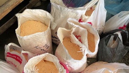 Gazans resort to grinding lentils and pasta for bread baking amid flour shortages