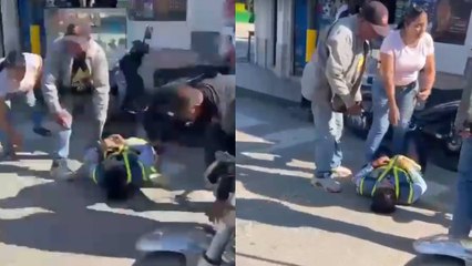 VIDEO | Motociclista cogió a golpes y atropelló a guarda de tránsito que intentó multarlo en Zarzal