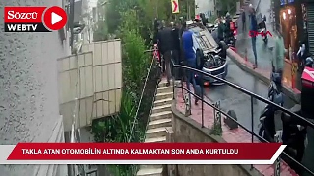 Beyoğlu'nda takla atan otomobilin altında kalmaktan son anda kurtuldu
