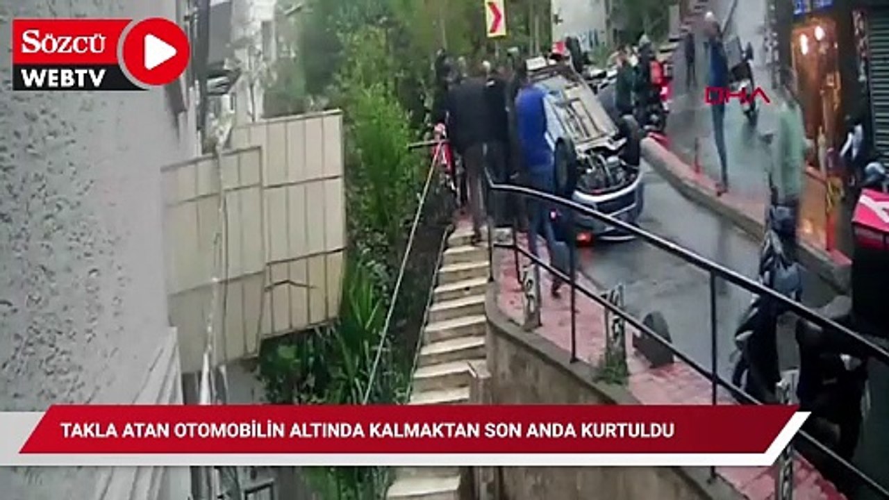 Beyoğlu'nda takla atan otomobilin altında kalmaktan son anda kurtuldu