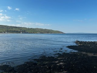 Cushendun waves on a sunny day