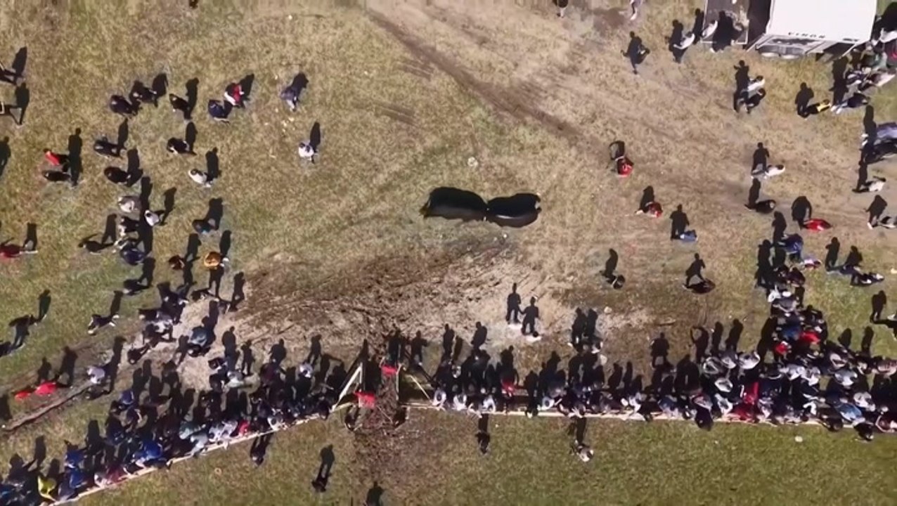 Moment bullfight spectators run for safety after rampaging animal escapes ring
