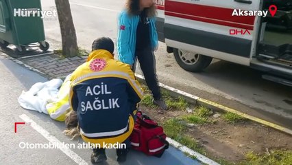 Otomobilden atılan kadın baygın bulundu