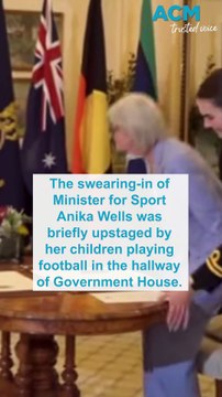 Sports minister’s swearing-in briefly interrupted by football game in Government House hallway