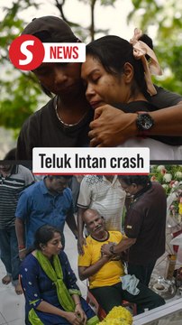 Mourners pay final respects to Corporal Nurit, Sergeant Perumal