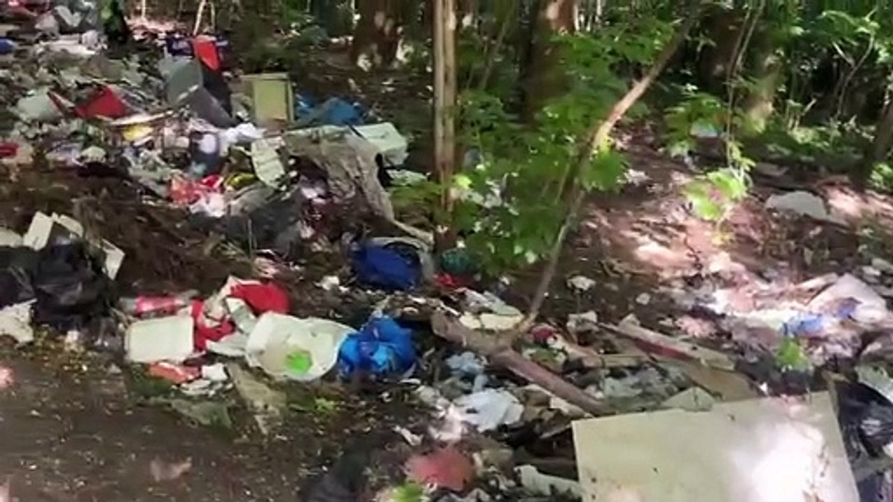 Piles of flytipping in Sheffield green space behind Park Hill Flats