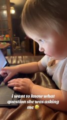 Toddler Pretends to Work at Screen and Babbles in Gibberish