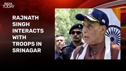 Rajnath Singh interacts with soldiers at an air base in Srinagar