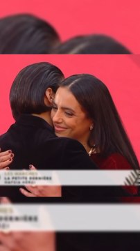 Hafsia Herzi, cinéaste franco-algéro-tunisienne, est présente sur le tapis rouge du Festival de Cannes pour représenter La Petite Dernière, son 3ᵉ film dans ce rôle, avec l'espoir de décrocher la Palme d'or.