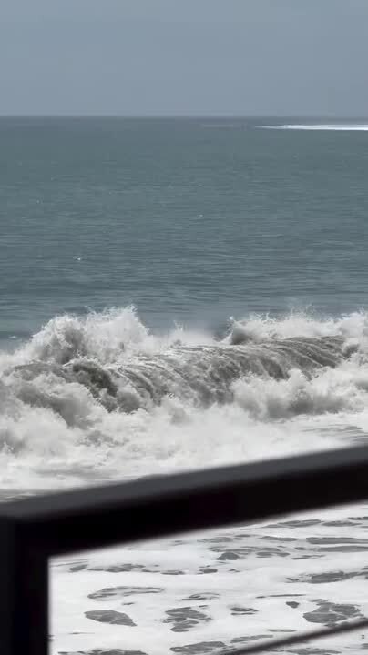 Woman Gets Swept Off Her Feet and Plunges into Water While Paddle Boarding