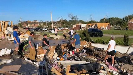 Roofless houses, upside-down cars: deadly tornado damage in the southern US