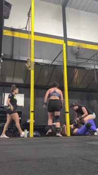 Woman Loses Her Grip While Doing Pull-Ups and Falls Down