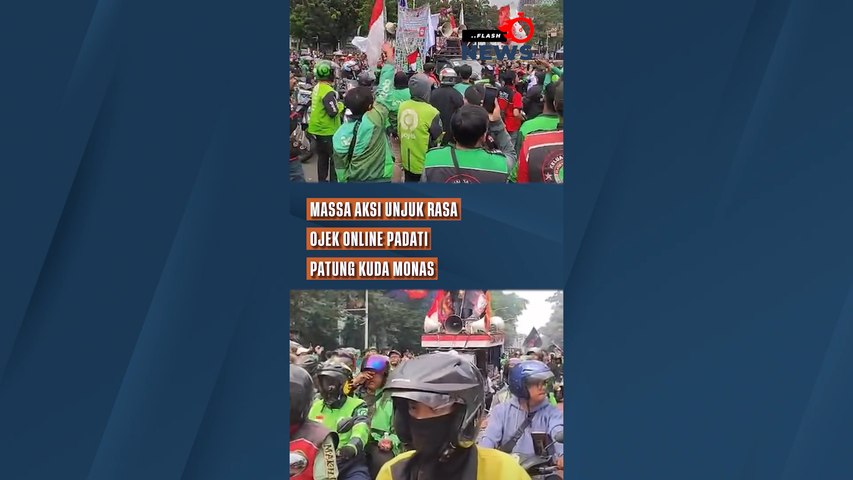 Massa Aksi Unjuk Rasa Ojek Online Padati Patung Kuda Monas