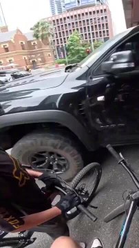 Cyclist Narrowly Escapes Getting Hit by Speeding Car