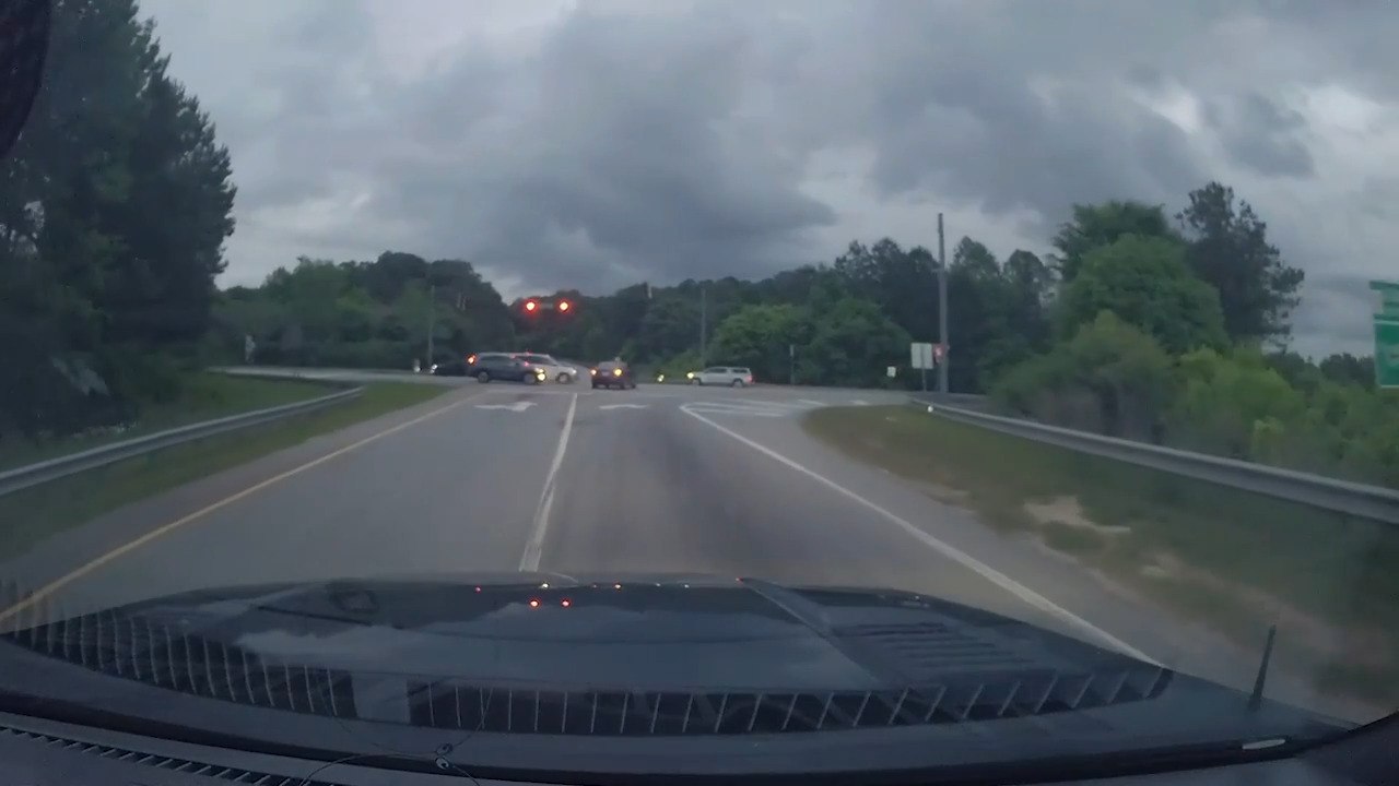 Car Jumps Signal and Causes Collision at Intersection