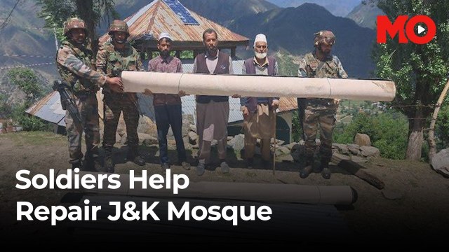 Soldiers help repair mosque damaged in Pakistan shelling in J&K Village