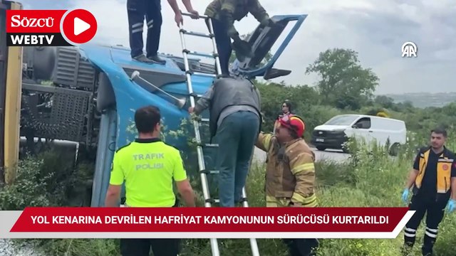 Arnavutköy'de yol kenarına devrilen hafriyat kamyonunun sürücüsü kurtarıldı