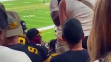 Man beats couple at football game