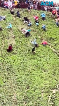 Daredevils hurl downhill in wild UK cheese rolling race
