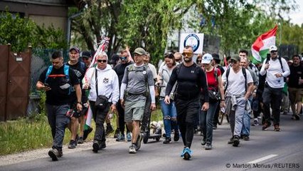 Orban's political rival Peter Magyar walks to Romania