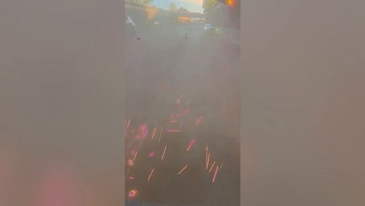 Watch: Dramatic moment police chase suspect down dual carriageway on foot