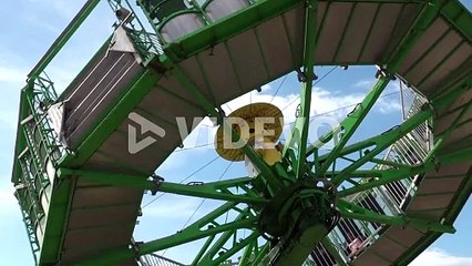 Carnival or Fair Spinning Ride Wide Shot