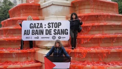 Blood-red water pours down Paris fountain in pro-Palestine protest