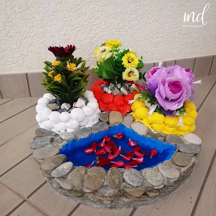 These DIY cement vases will make your front yard flowers look more gorgeous than they already are!