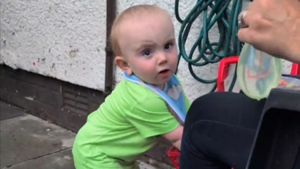 Summer fun goes wrong: Kid gets soaked by his own water balloon