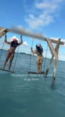 Woman Falls Into Water as She Tries to Stand up on Swing