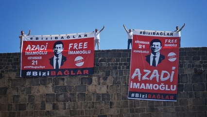 Diyarbakır'da surlara asılan 'İmamoğlu' pankartlarına polis el koydu