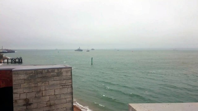 Decommissioned Royal Navy ship HMS Northumberland being towed in Portsmouth