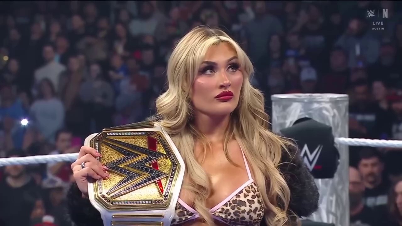 WWE women's champion's Rhea Ripley and Tiffany in the ring WWE