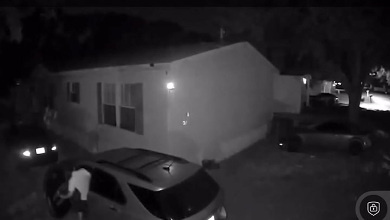 Terrifying moment man forces ex into truck of car after stalking her with tracking device