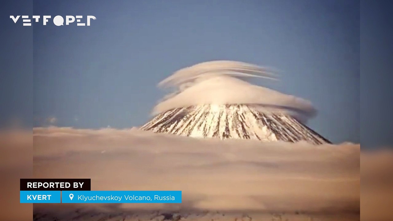 A stunning lenticular cloud forms over Klyuchevskoy Volcano, Russia! The formation was captured by a KVERT camera.