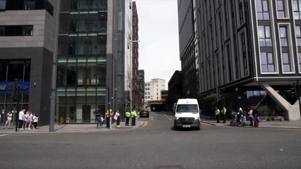 Van carrying man accused in Liverpool crash leaves court