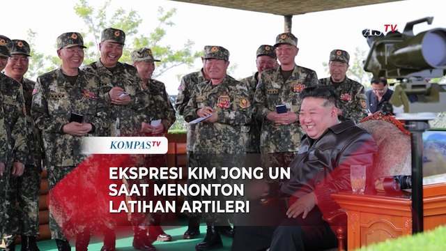 Ekspresi Pemimpin Korea Utara Kim Jong Un saat Menonton Latihan Artileri