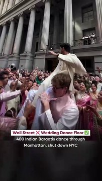 Wall Street, the heart of global finance, turned into a wedding dance floor as a 400-person Indian baraat danced through the streets of Lower Manhattan. The viral moment featured vibrant traditio