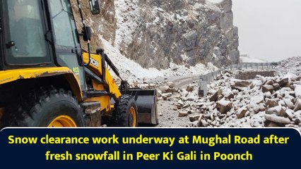 Snow clearance work underway at Mughal Road after fresh snowfall in Peer Ki Gali in Poonch