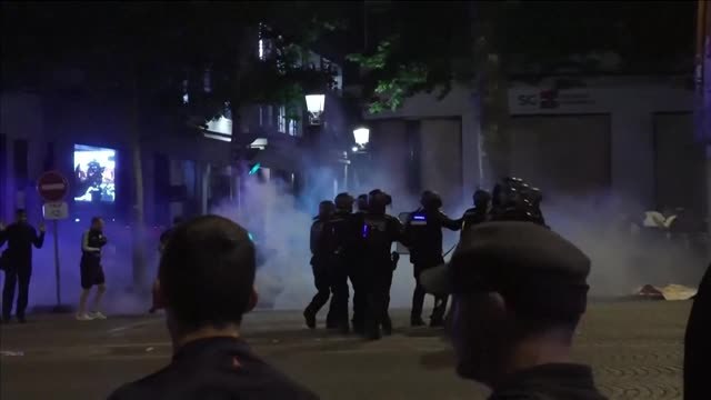 Police fire tear gas on Champs-Elysees as PSG celebrations turn ugly