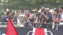 Doue dances with Champions League trophy