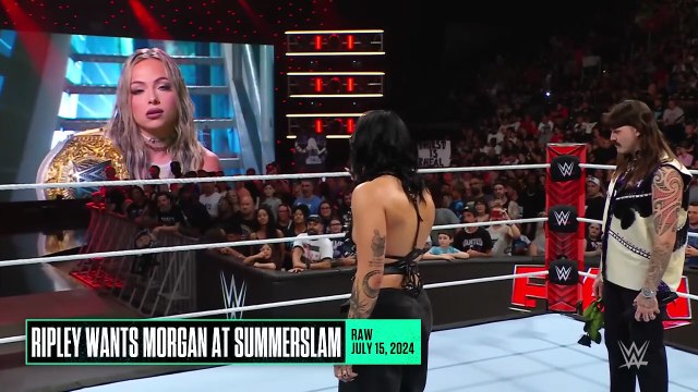 Liv Morgan and Rhea Ripley and Dominic Mysterio in the ring WWE