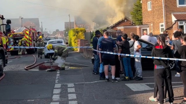 House fire in Alvaston, Derby draws a crowd as firefighters work to control spreading blaze