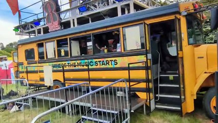 Bands perform on top of a bus at the Great Estate Festival