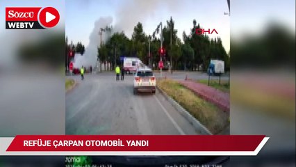 Refüje çarpan otomobil yandı